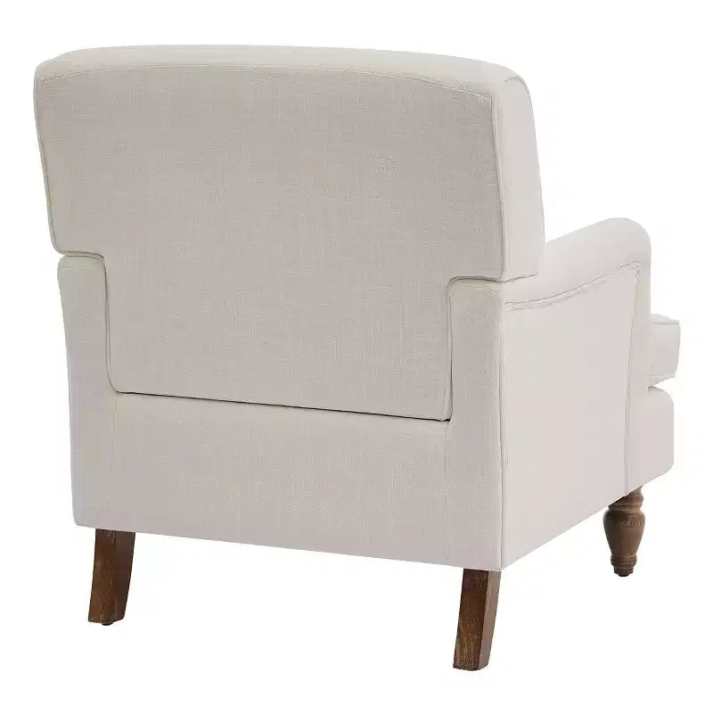 Poltrona in misto lino con braccioli arrotolati e gambe tornite in legno massello
