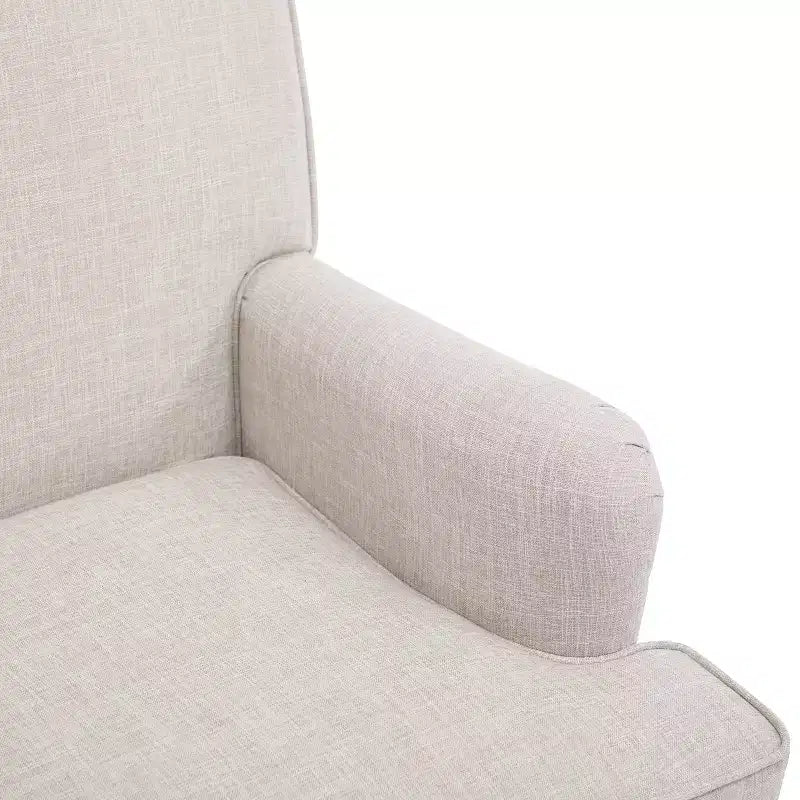 Poltrona in misto lino con braccioli arrotolati e gambe tornite in legno massello